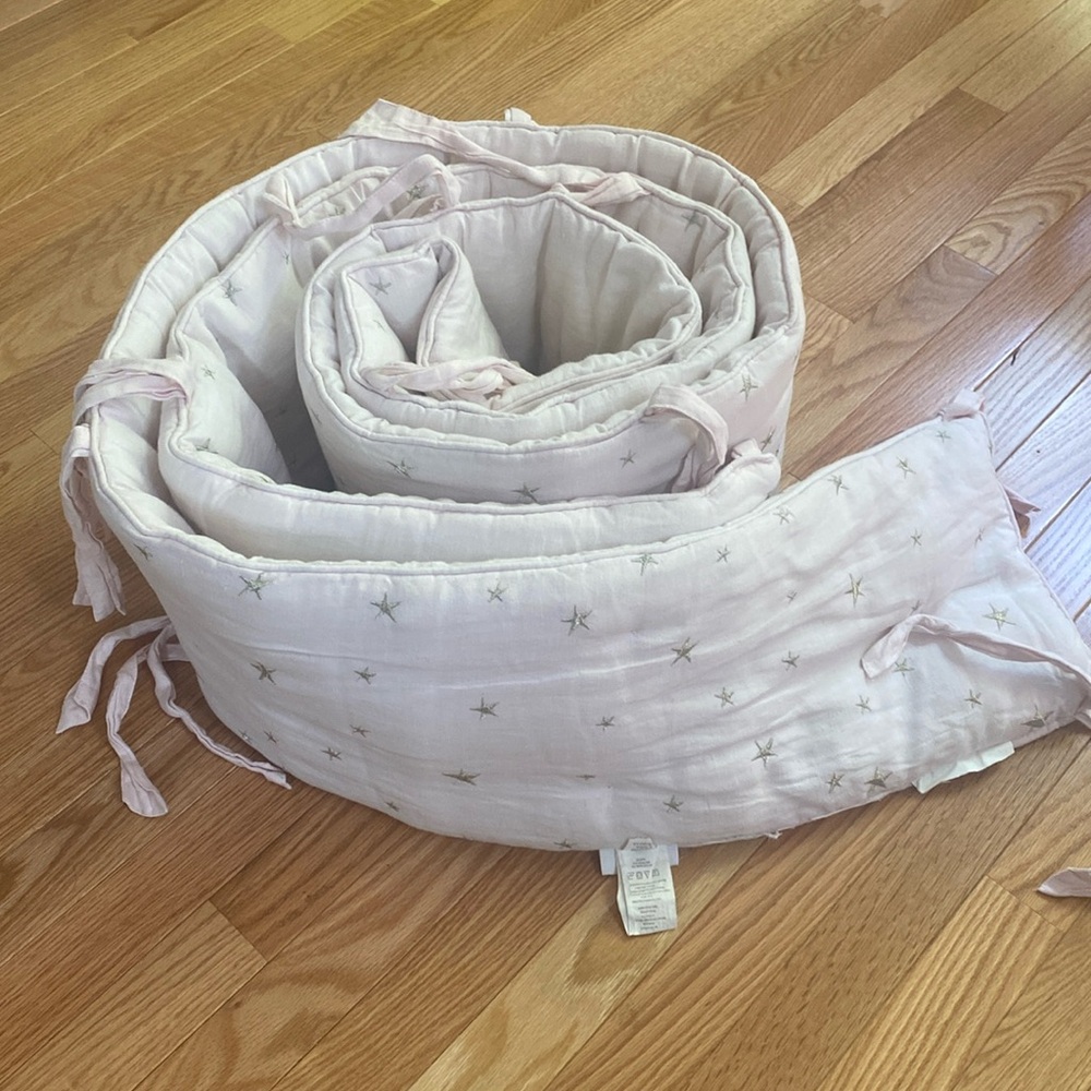 Pottery Barn Kids Starry Crib Bumper - very light pink  and Gold